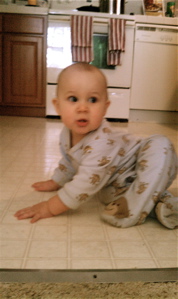 Isabella in the kitchen helping me prep vegetables.
