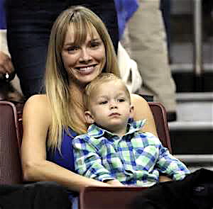 The coach's wife, Amanda Marcum with her son at the Georgetown game.