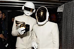 The robots of Daft Punk showing off one of their multiple Grammy's from Sunday.
