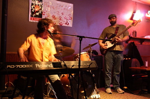 Zollo behind his keyboard like on so many a night, leading his band the Body Electric.